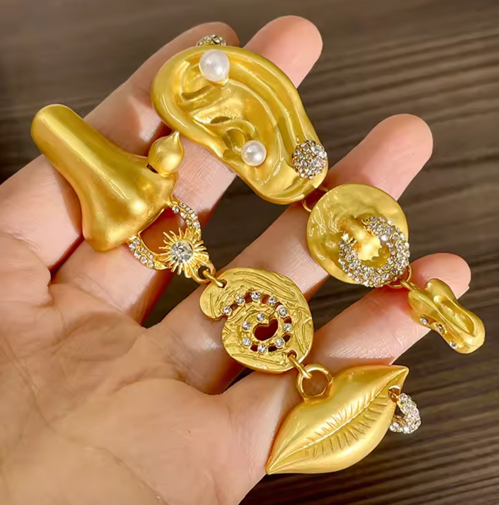 Asymmetrical Human Face Earrings